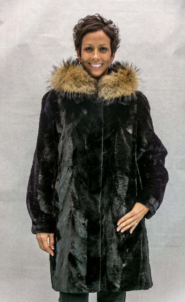 W51 black sheared mink 36 sections with a detachable hood trimmed with finnish raccoon reverses to black taffeta silk2 e1506396682489