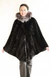 black sheared mink sections 36 chevron design with grooving detail cape parka and indigo fox trim around the hood1